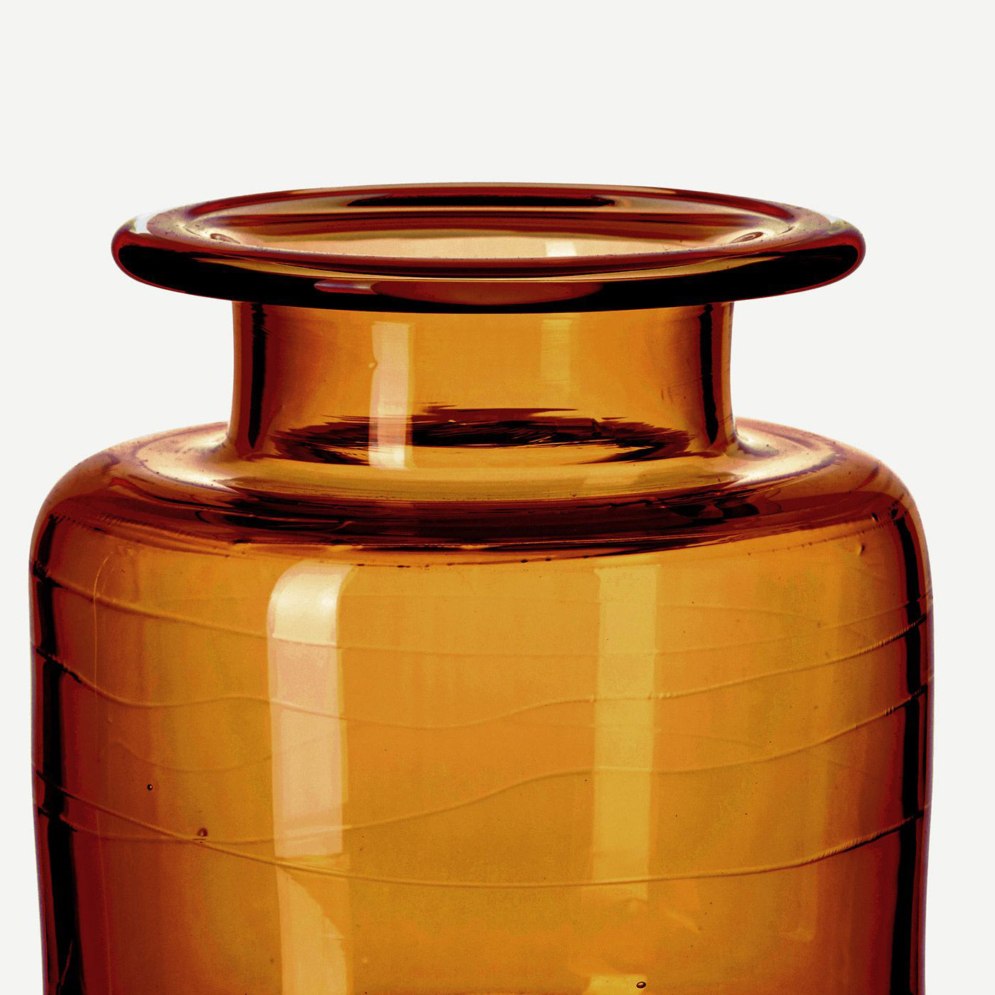 close up amber brown apothecary jar vase