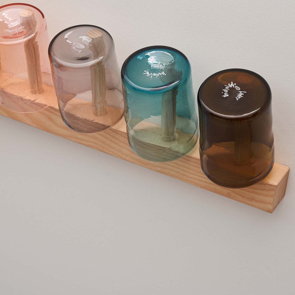 coloured drinking glasses and wall rack