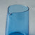 close up of blue glass jug