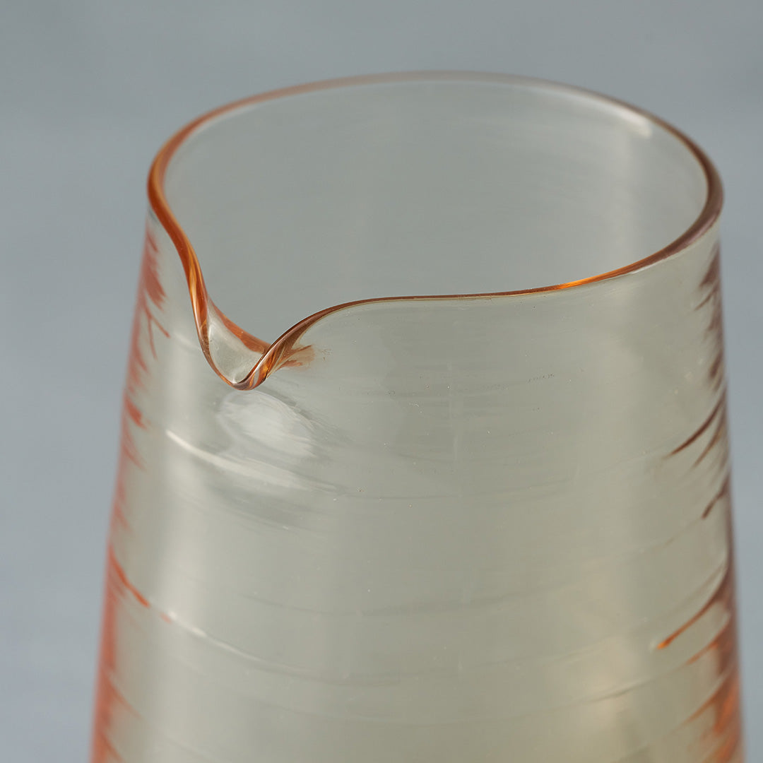 close up of hand blown glass jug