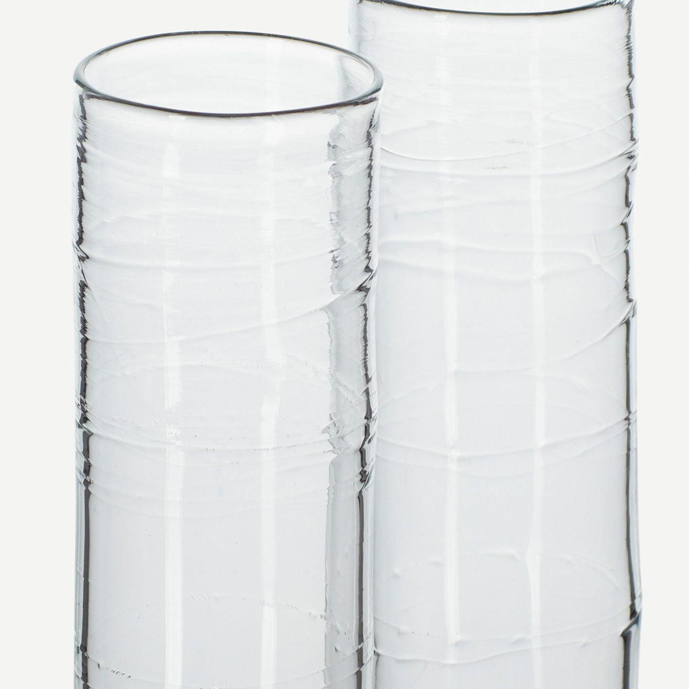 a pair of clear glass champagne flutes