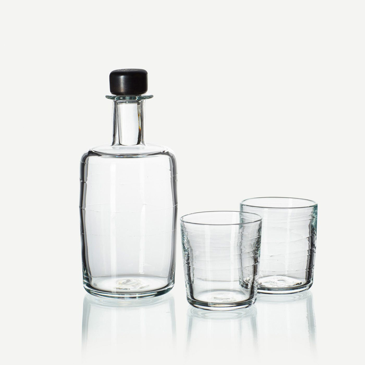 Clear glass whisky decanter and glasses