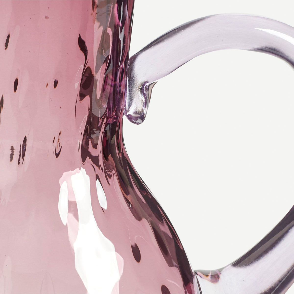 handblown purple glass vase with handle 