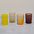 Set of four coloured drinking glasses