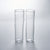 a pair of clear glass champagne flute